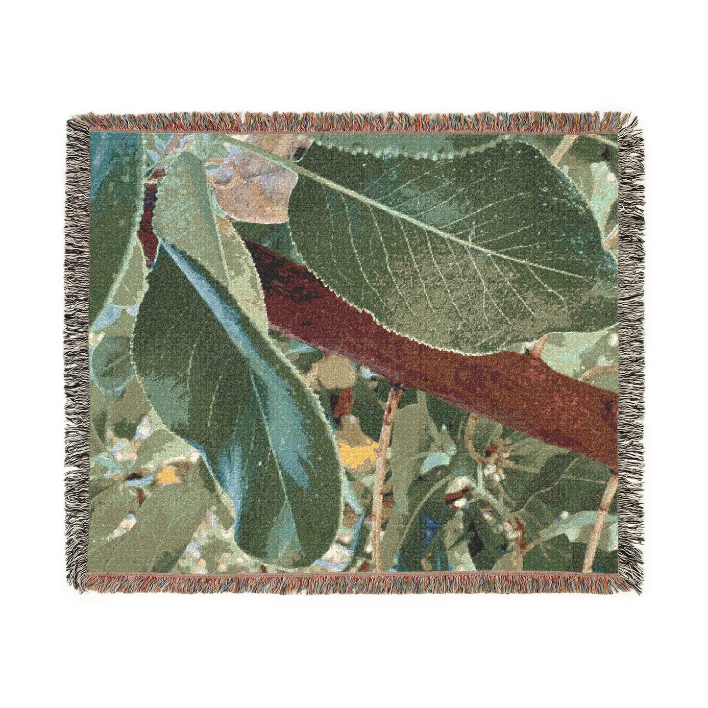 Woven blanket with leaf pattern on a white background