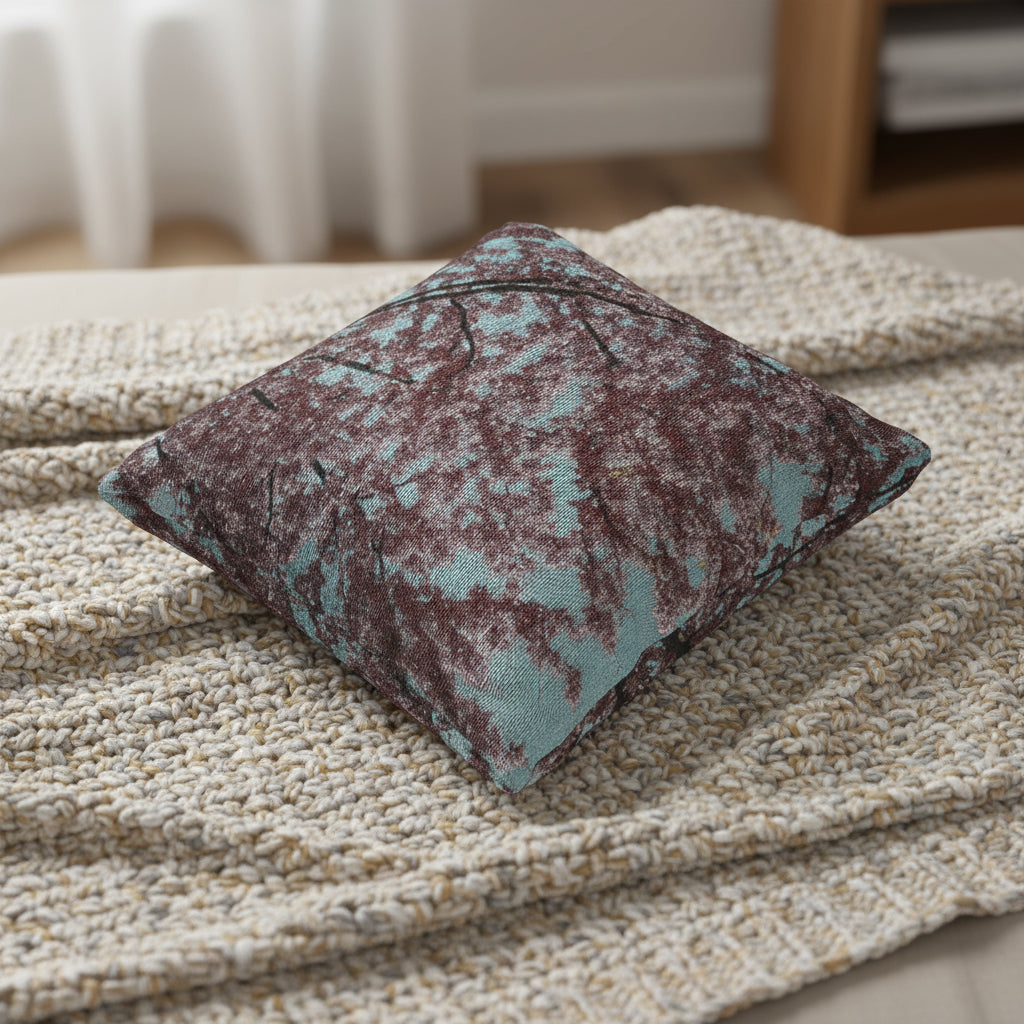 Folded fabric with a marbled pattern on a white background, size 17" by 18"