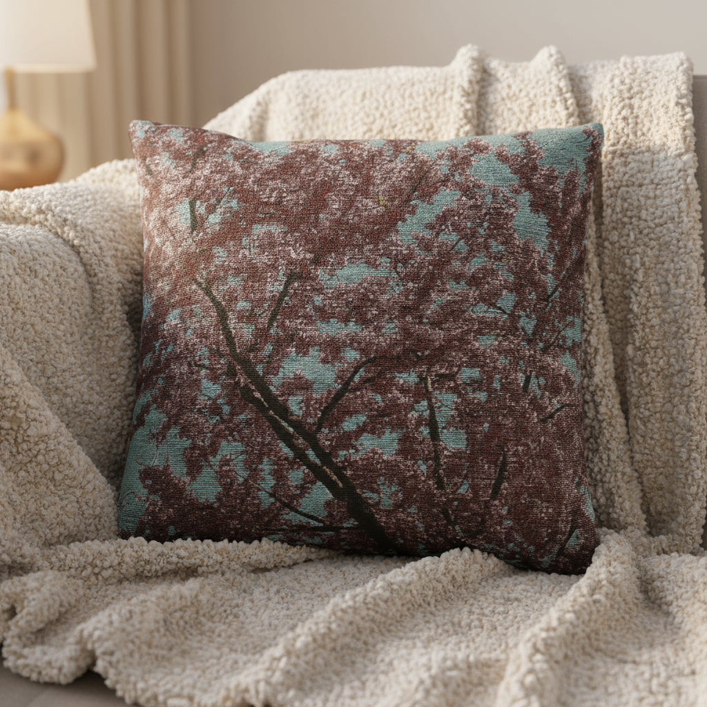 Decorative pillow with a floral pattern on a white background. Size is 17" x 18"