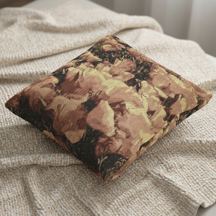 Decorative pillow on a couch with a cozy blanket, size 17" by 18"