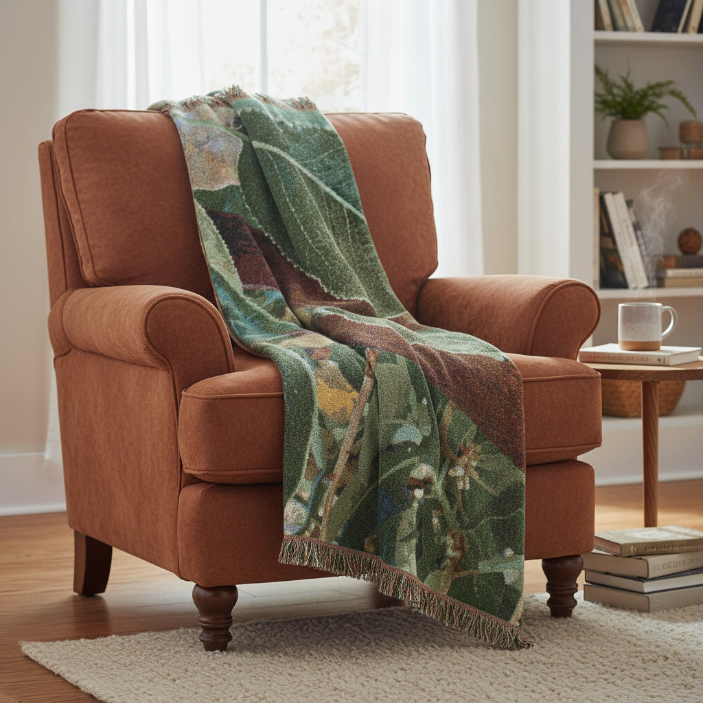Woven blanket with leaf pattern on a white background